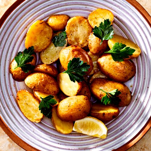 Photo of Lemon Potatoes from Chios Taverna by Michael Symon